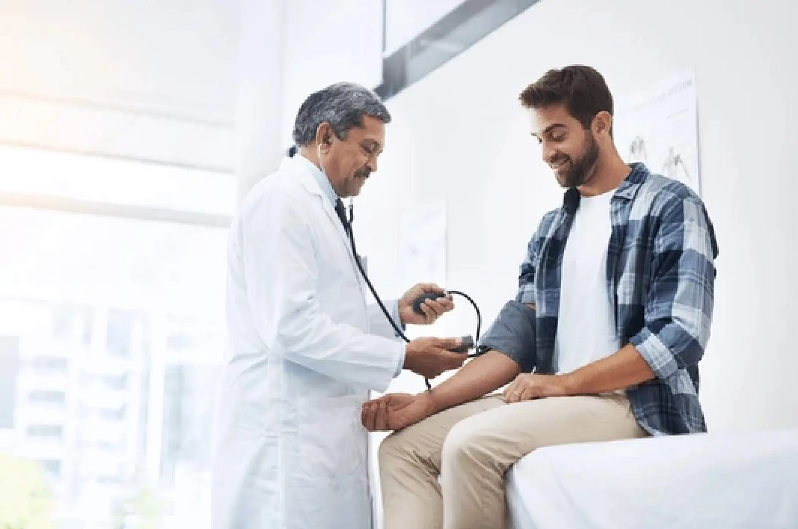 Young man receiving annual general health check