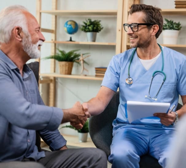 An old patient is communicating with doctor